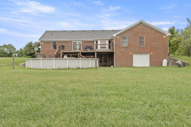 back of house with a lawn and a deck