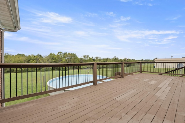 deck featuring a lawn