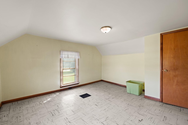 bonus room featuring lofted ceiling