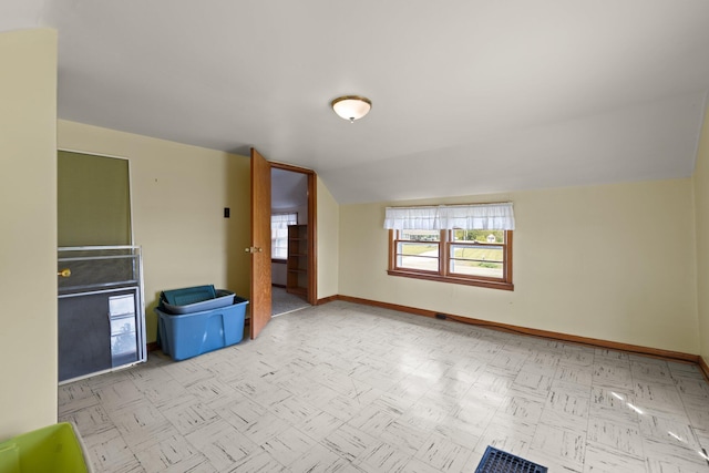 interior space featuring vaulted ceiling