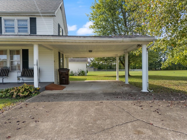 view of car parking with a lawn