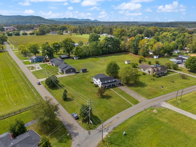 birds eye view of property featuring a mountain view