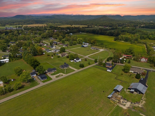 aerial view at dusk with a mountain view