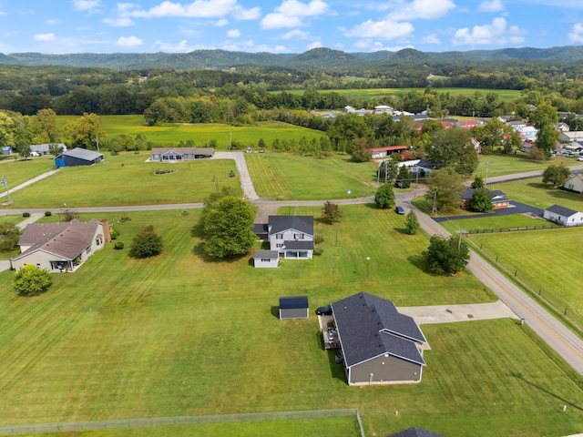 birds eye view of property featuring a rural view