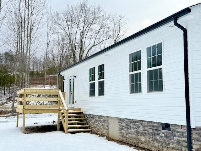 view of snow covered property