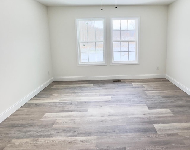 empty room featuring light wood-type flooring