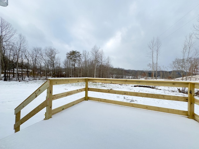 view of yard layered in snow