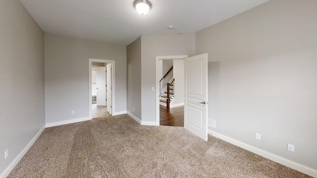 unfurnished bedroom with carpet flooring