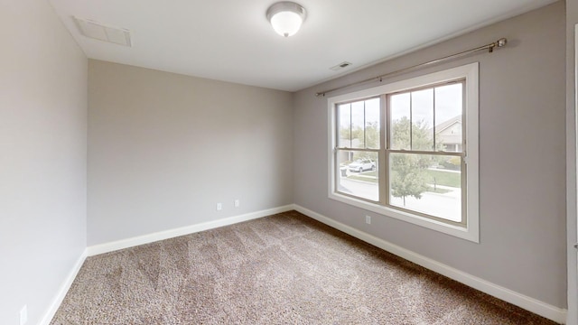 view of carpeted spare room