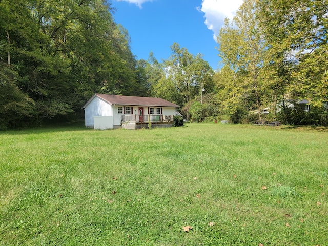 view of yard with a wooden deck