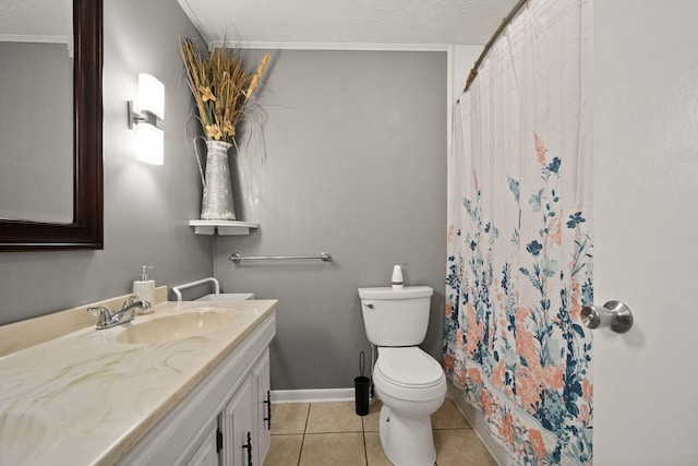 bathroom with vanity, a textured ceiling, tile patterned flooring, ornamental molding, and toilet