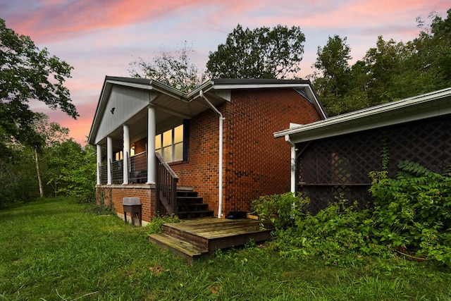 exterior space with a lawn