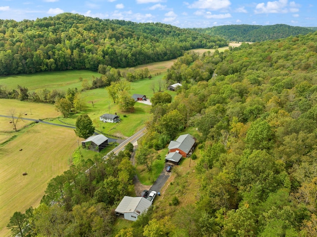 birds eye view of property featuring a rural view