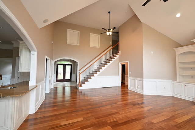 spacious closet featuring dark hardwood / wood-style flooring