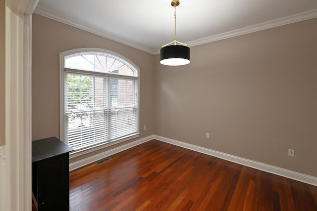 unfurnished living room with built in features, a healthy amount of sunlight, and dark hardwood / wood-style flooring