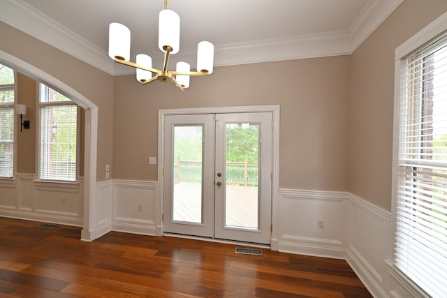 kitchen featuring dark hardwood / wood-style flooring, white cabinets, kitchen peninsula, sink, and appliances with stainless steel finishes