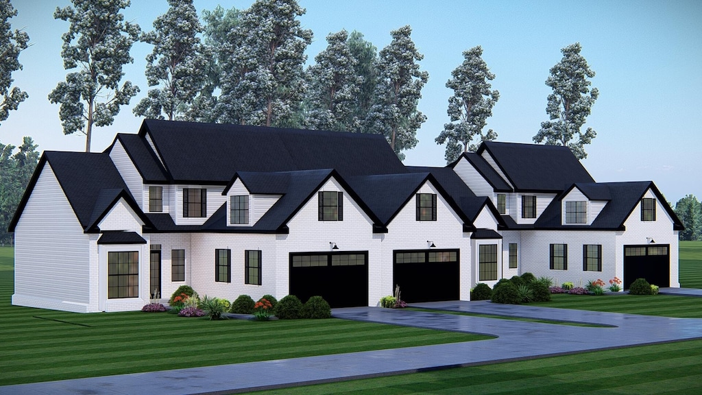 modern farmhouse style home featuring a front lawn, an attached garage, and brick siding
