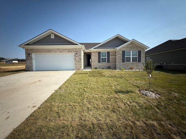 view of front facade featuring a garage and a front yard