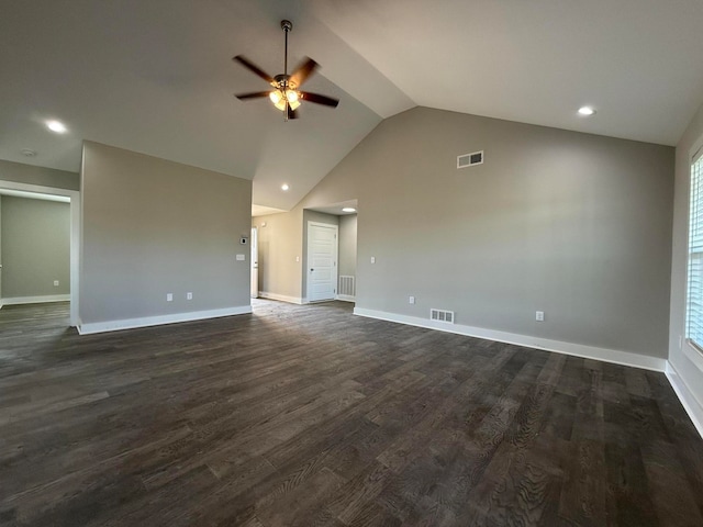 unfurnished living room with lofted ceiling, dark hardwood / wood-style floors, and ceiling fan