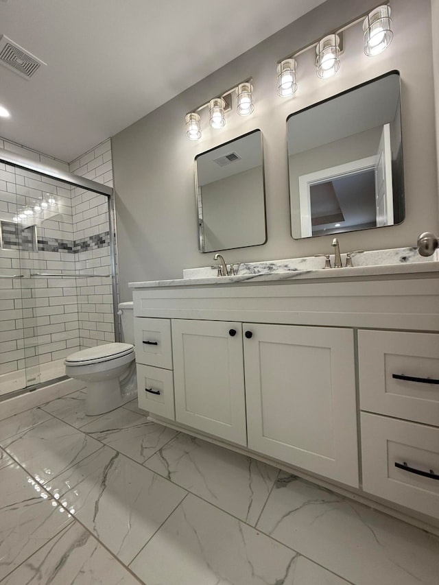 bathroom featuring walk in shower, vanity, and toilet