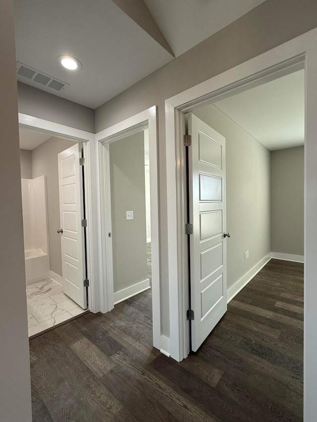 hall featuring dark hardwood / wood-style floors