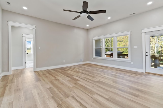 unfurnished living room featuring ceiling fan, light wood-style flooring, recessed lighting, visible vents, and baseboards