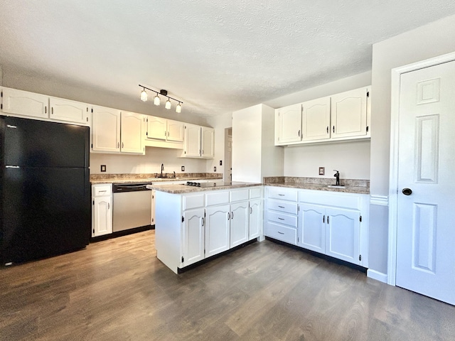 kitchen featuring black appliances and white cabinetry