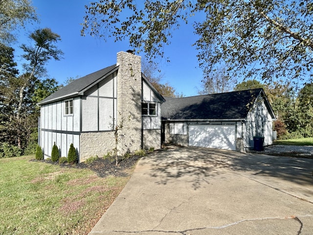 view of side of home featuring a garage