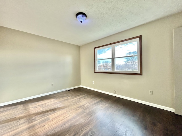 unfurnished room featuring wood-type flooring