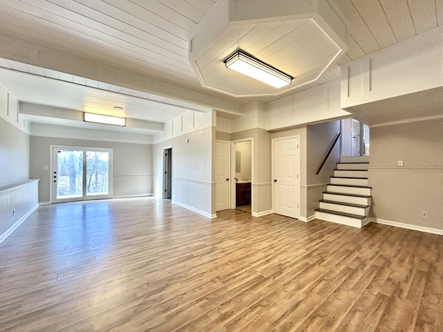 basement with hardwood / wood-style flooring