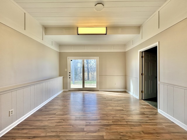 spare room featuring hardwood / wood-style floors