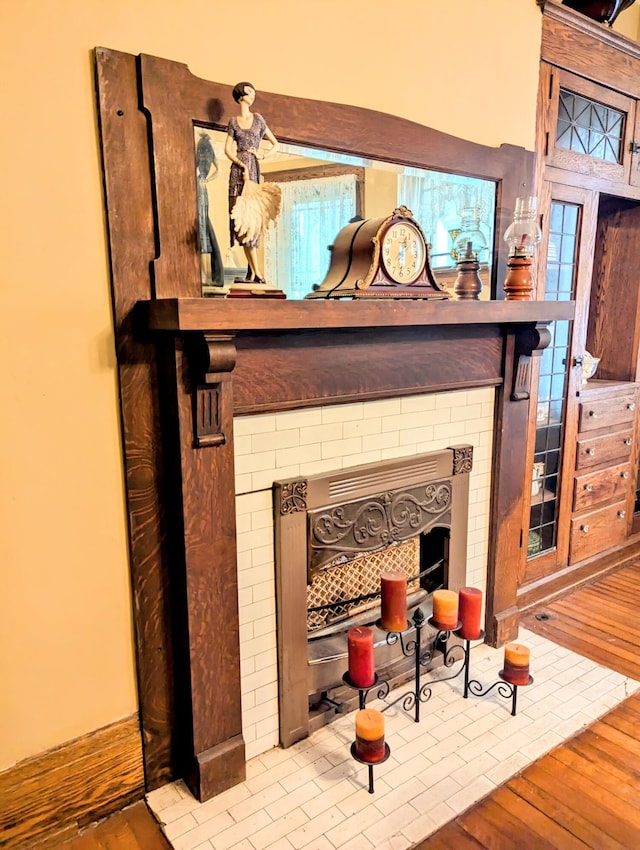 interior details featuring hardwood / wood-style flooring