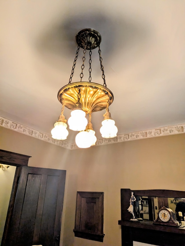 interior details with an inviting chandelier