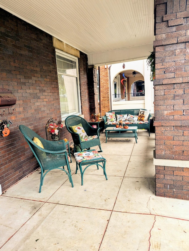 view of patio featuring a porch