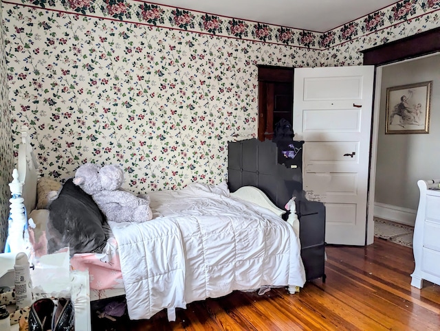 bedroom featuring wood-type flooring