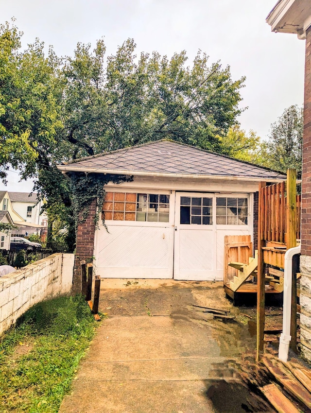 view of outbuilding featuring a garage