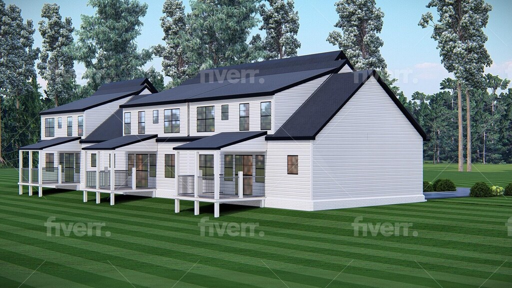 back of house with a lawn
