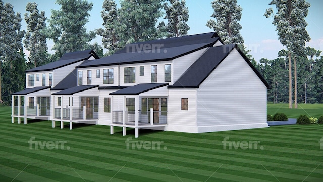 back of house with a lawn