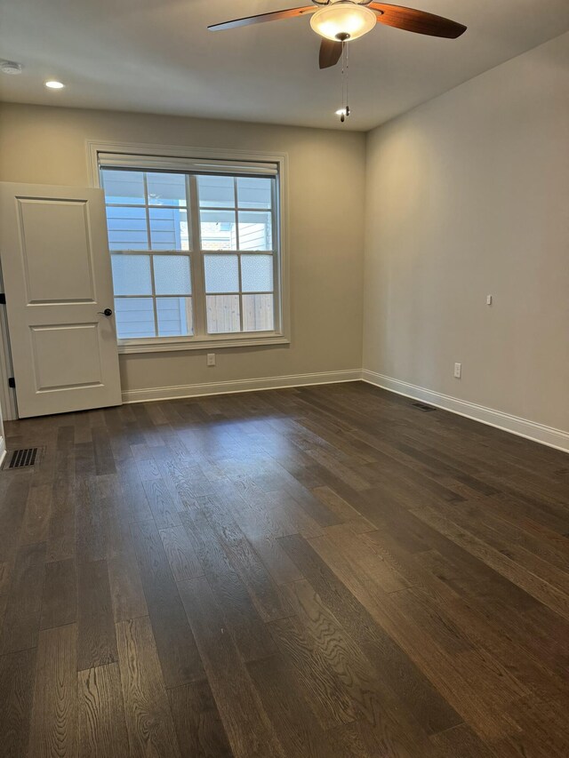 bathroom featuring vanity, ceiling fan, and an enclosed shower