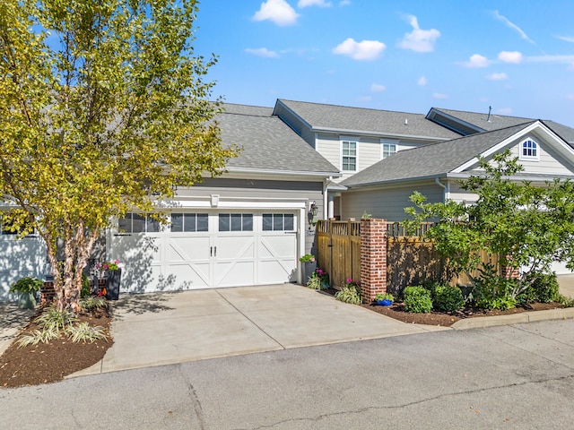 view of front of property with a garage