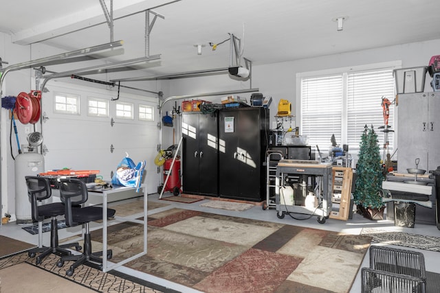 garage featuring a garage door opener