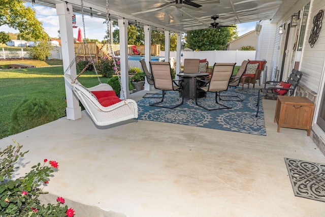 view of patio / terrace featuring ceiling fan