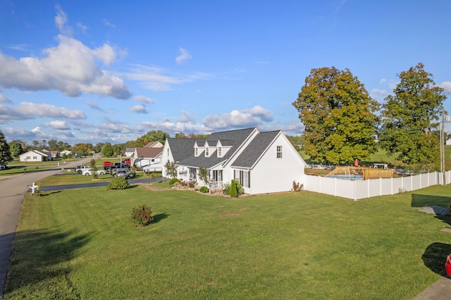 view of property exterior with a yard