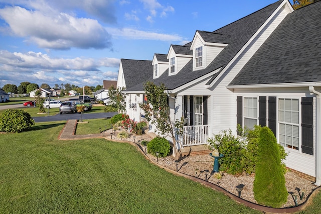 view of yard with covered porch