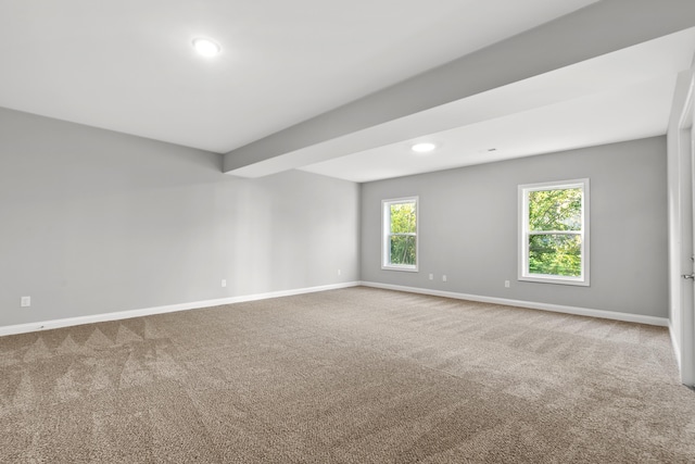 carpeted empty room with recessed lighting and baseboards