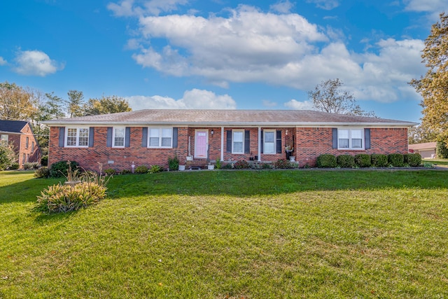 ranch-style house with a front lawn