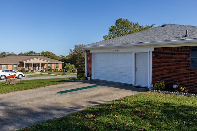 garage with a yard