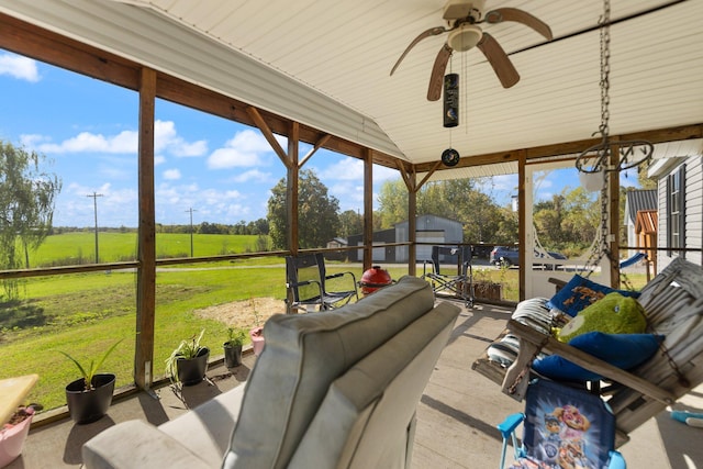 view of patio / terrace featuring ceiling fan and an outdoor living space