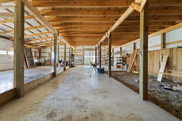 misc room with concrete flooring