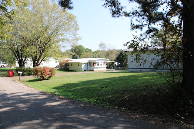 view of front of house with a front lawn